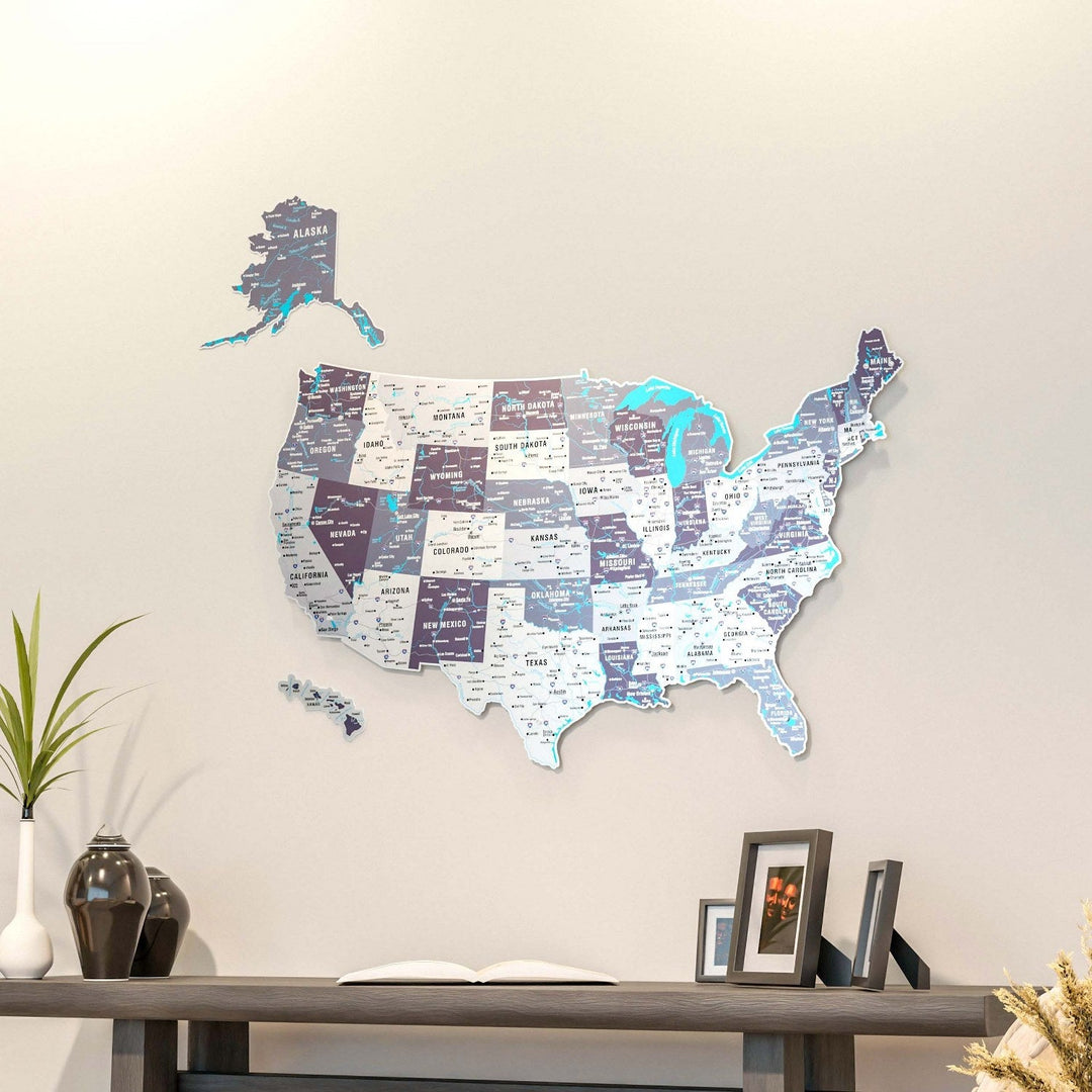a golden color usa wall map art hanged on a burgundy wall