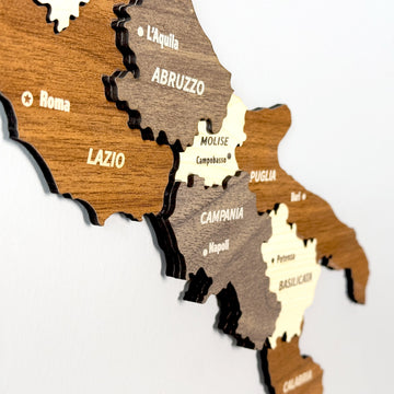 Close-up of central and southern Italy on the wood map showing Lazio, Abruzzo, Campania and Puglia