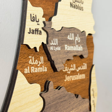 Close-up of Palestine wooden map layers with Jaffa, Ramallah, Al Lydd and Jerusalem in Arabic and English