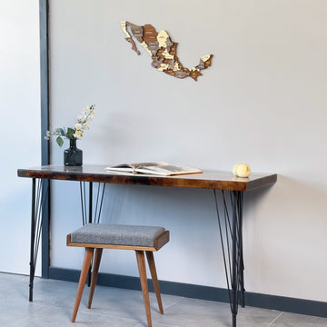Mexico wooden wall map high on a wall above a desk with a stool, seen from a lower left angle