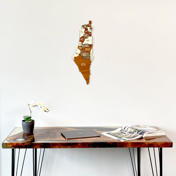 Palestine wooden wall map above a live-edge table with an orchid, tight crop