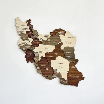 Iran wooden wall map with province names in Persian and English, cream, tan and brown wood, angled view