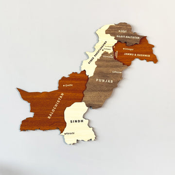 Pakistan wooden wall map with province names in brown, cream and gray wood layers, straight-on view