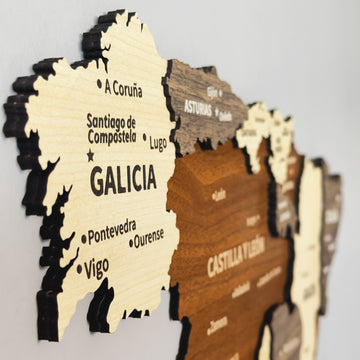 Side-angle close-up of the mixed color Spain wooden wall map showing Galicia, A Coruña and Vigo in layered wood