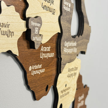 Close-up of Armenia wooden map layers with Yerevan, Ararat and Gegharkunik names in English and Armenian