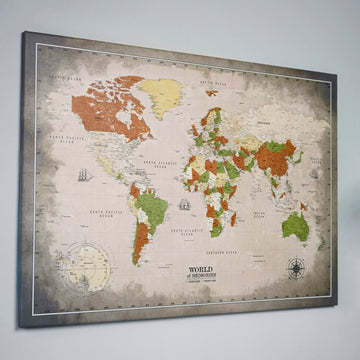 Sepia and beige canvas world map with distressed edges and the World of Memories logo, angled view on a gray wall