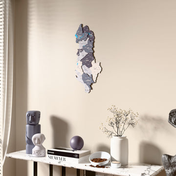 Nimbus Albania wooden wall map beside a sheer curtain, angled view