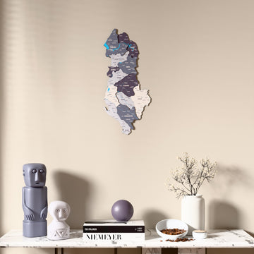 Nimbus Albania wooden wall map above a marble console, front view