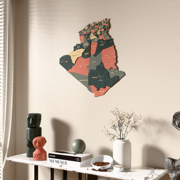 Sage Algeria wooden wall map beside a sheer curtain, angled view