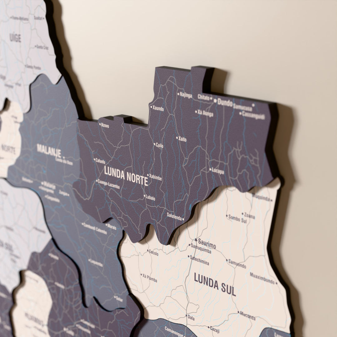 Close-up of the Nimbus Angola wooden wall map with layered regions and printed names