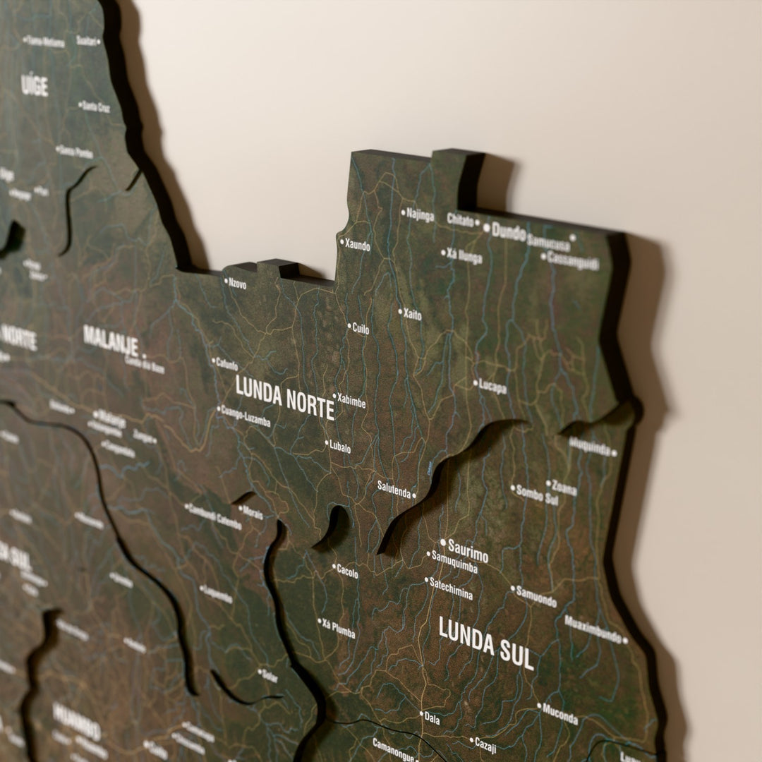 Close-up of the Satellite Angola wooden wall map with layered regions and printed names