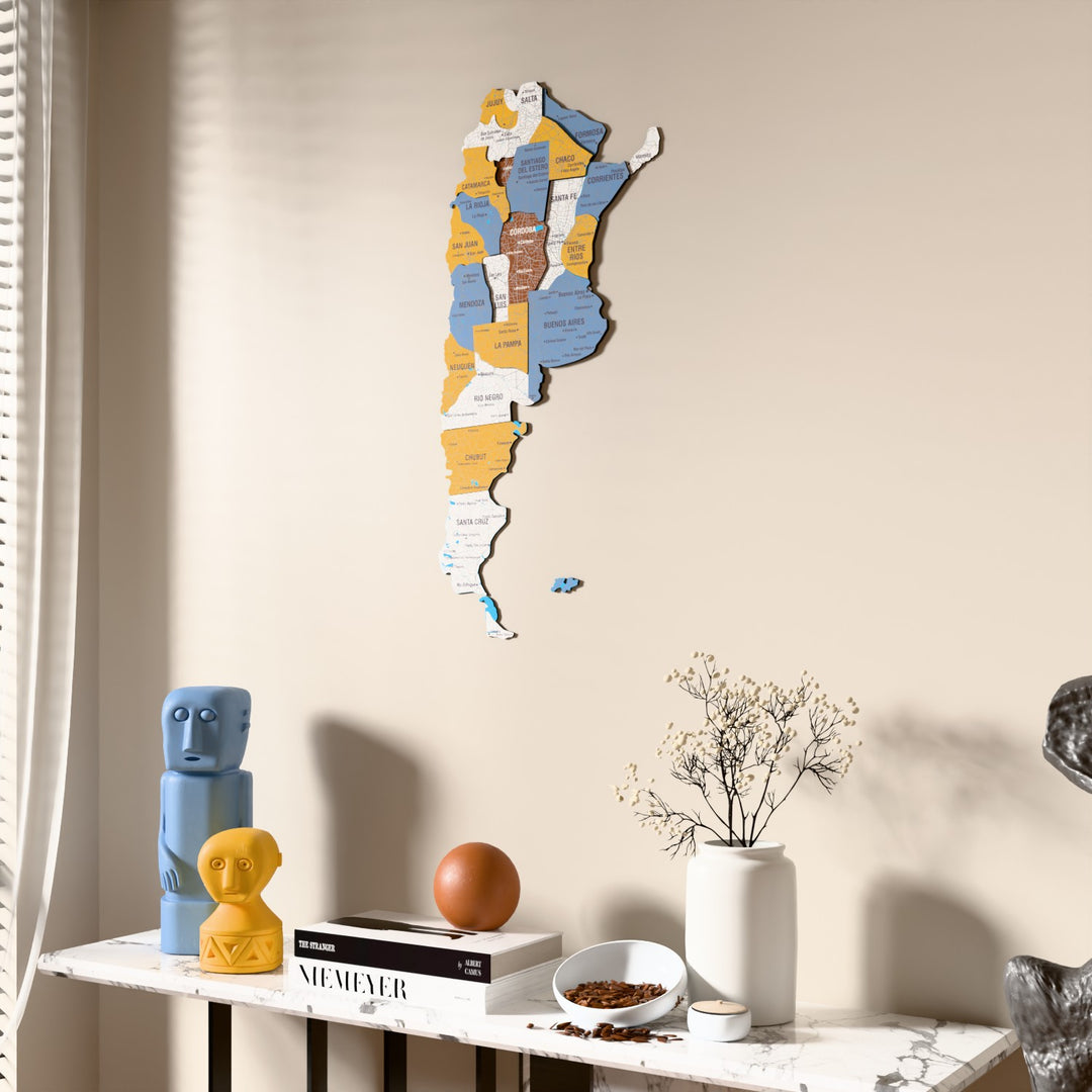 Flag colored Argentina wooden wall map beside a sheer curtain, angled view