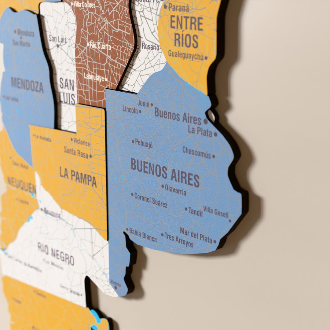 Close-up of the Flag colored Argentina wooden wall map with layered regions and printed names