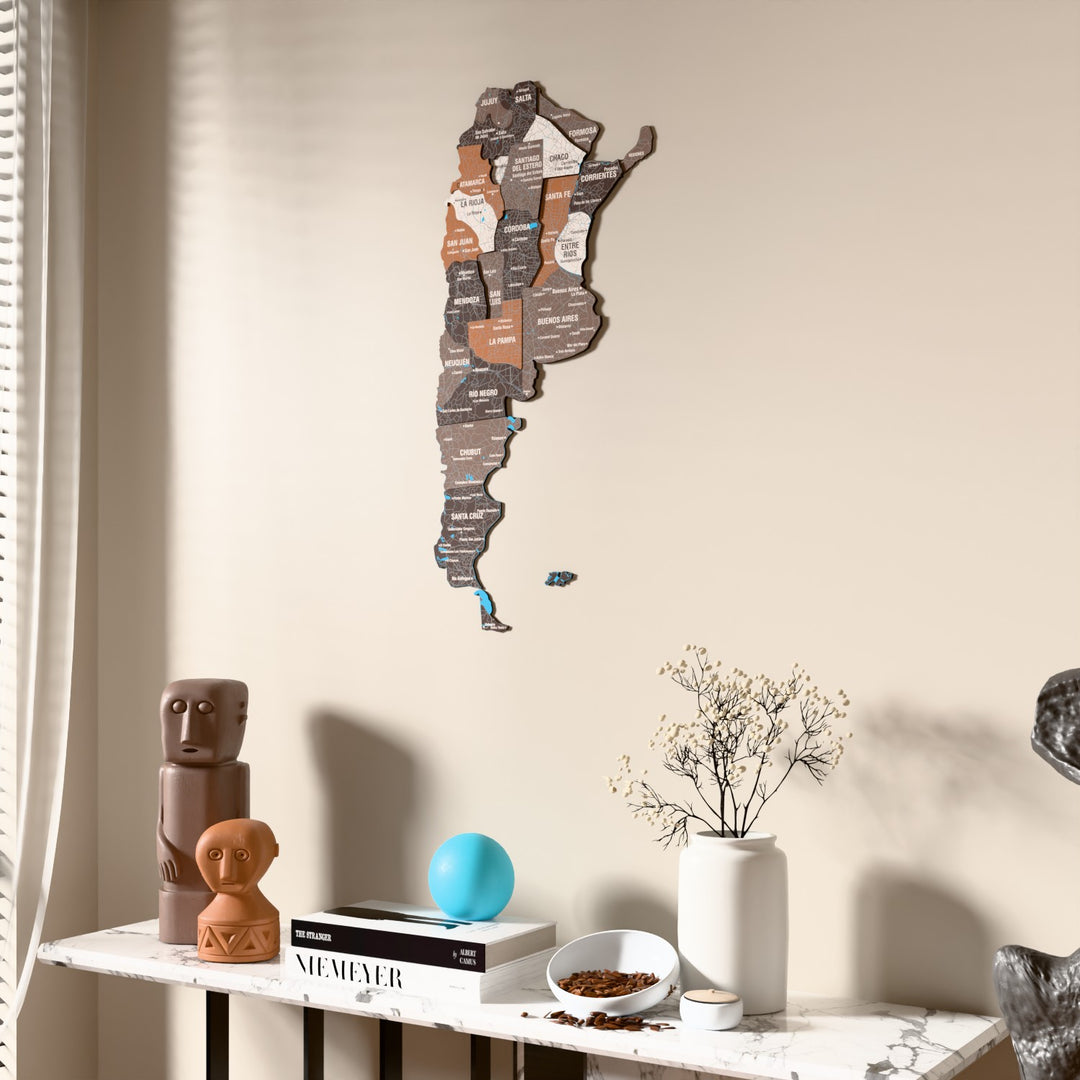 Soil Argentina wooden wall map beside a sheer curtain, angled view