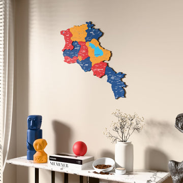 Flag colored Armenia wooden wall map beside a sheer curtain, angled view