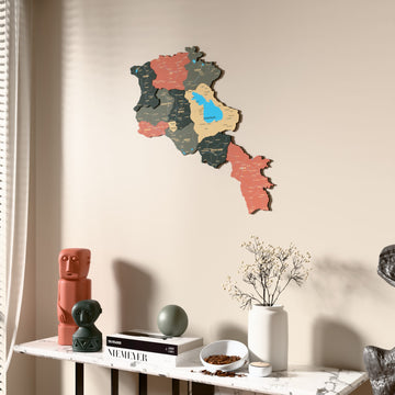 Sage Armenia wooden wall map beside a sheer curtain, angled view