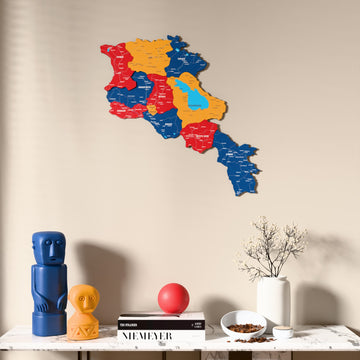 Flag colored Armenia wooden wall map above a marble console, front view
