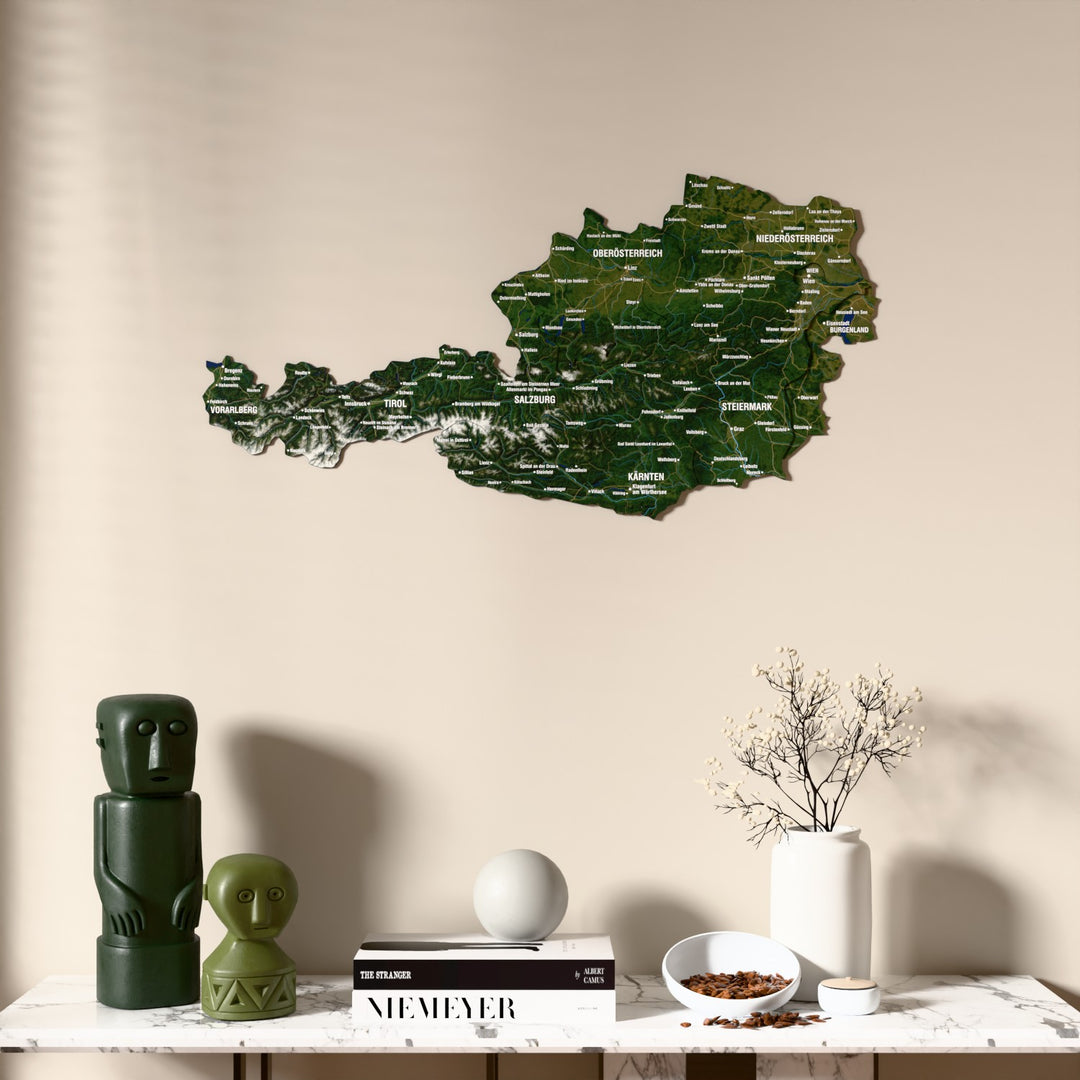 Satellite Austria wooden wall map above a marble console, front view