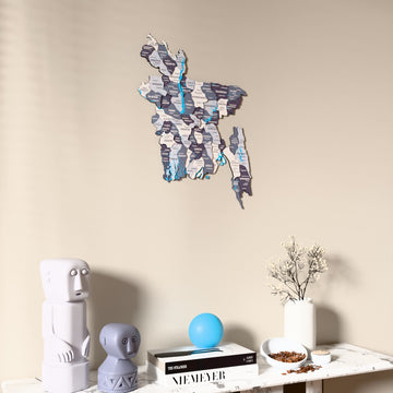 Nimbus Bangladesh wooden wall map on a beige wall above a console with figurines