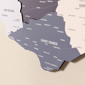 Close-up of the Nimbus Barbados wooden wall map with layered regions and printed names