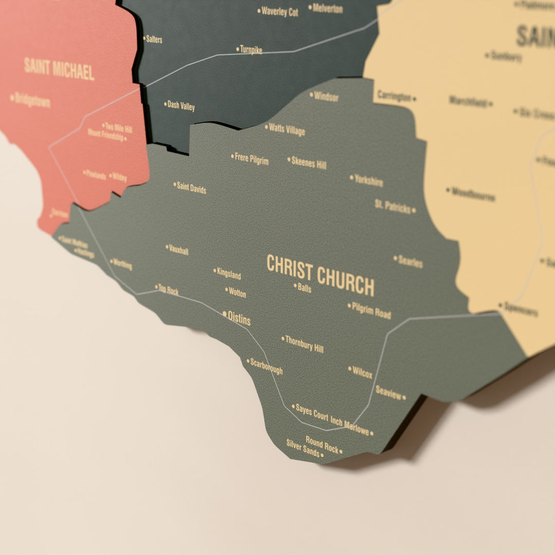 Close-up of the Sage Barbados wooden wall map with layered regions and printed names