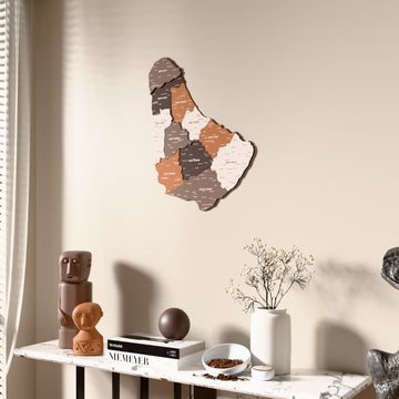 Soil Barbados wooden wall map beside a sheer curtain, angled view