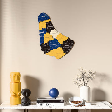 Flag colored Barbados wooden wall map above a marble console, front view