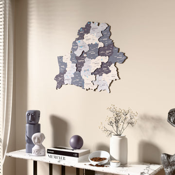 Nimbus Belarus wooden wall map beside a sheer curtain, angled view