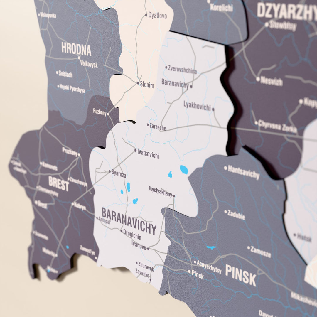 Close-up of the Nimbus Belarus wooden wall map with layered regions and printed names