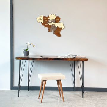 Belgium wooden wall map above a live-edge desk, wide view