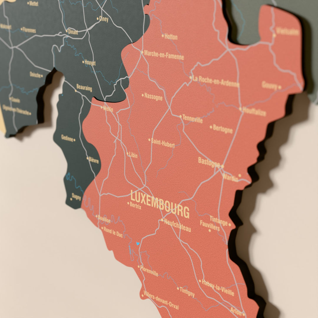 Close-up of the Sage Belgium wooden wall map with layered regions and printed names