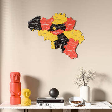 Flag colored Belgium wooden wall map above a marble console, front view