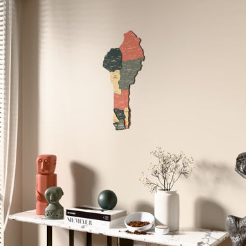Sage Benin wooden wall map beside a sheer curtain, angled view