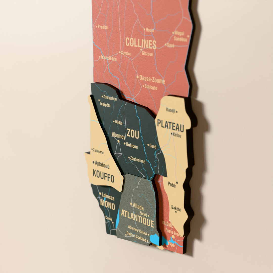 Close-up of the Sage Benin wooden wall map with layered regions and printed names