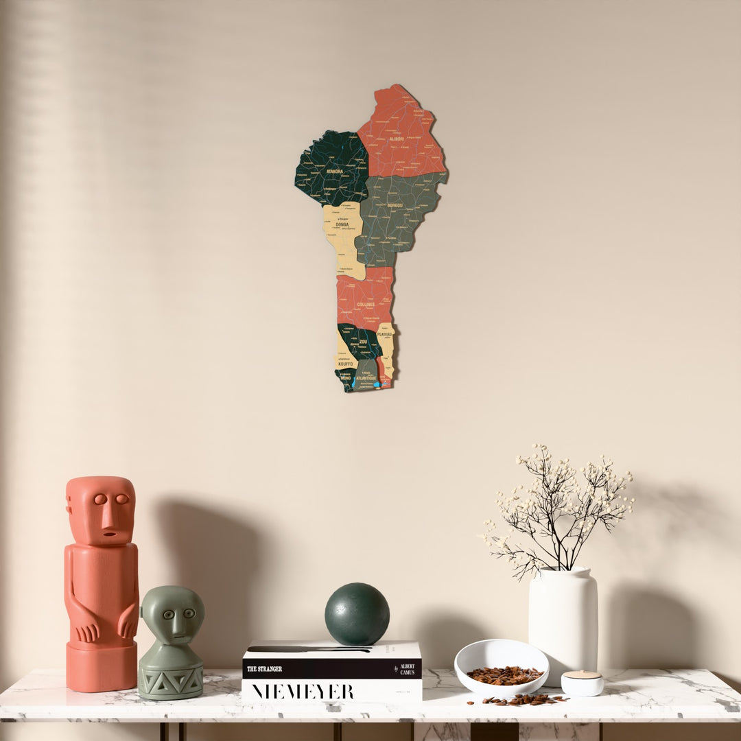 Sage Benin wooden wall map above a marble console, front view