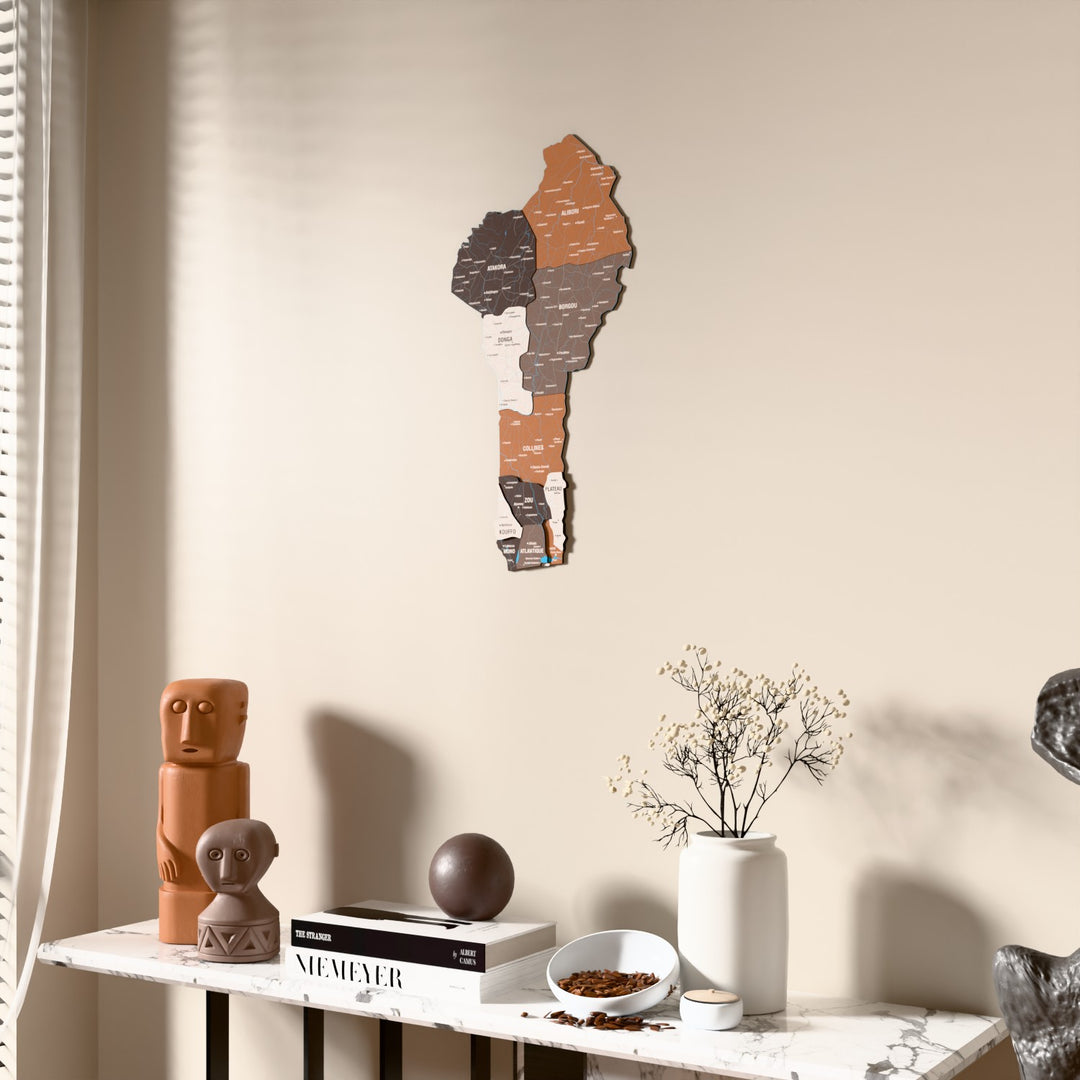 Soil Benin wooden wall map beside a sheer curtain, angled view