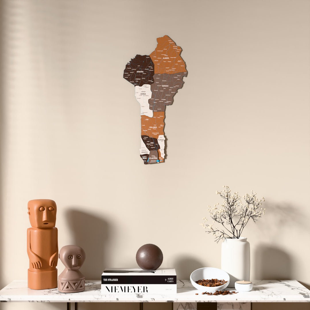 Soil Benin wooden wall map above a marble console, front view