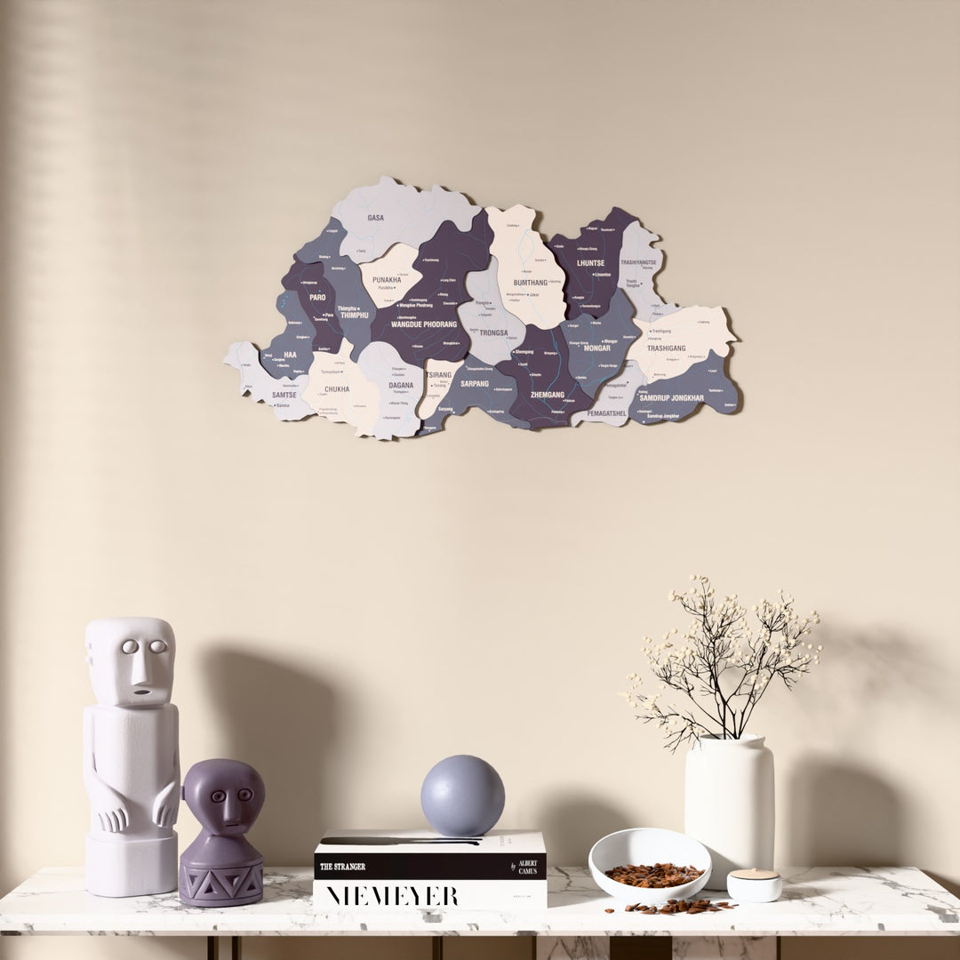 Nimbus Bhutan wooden wall map above a marble console, front view