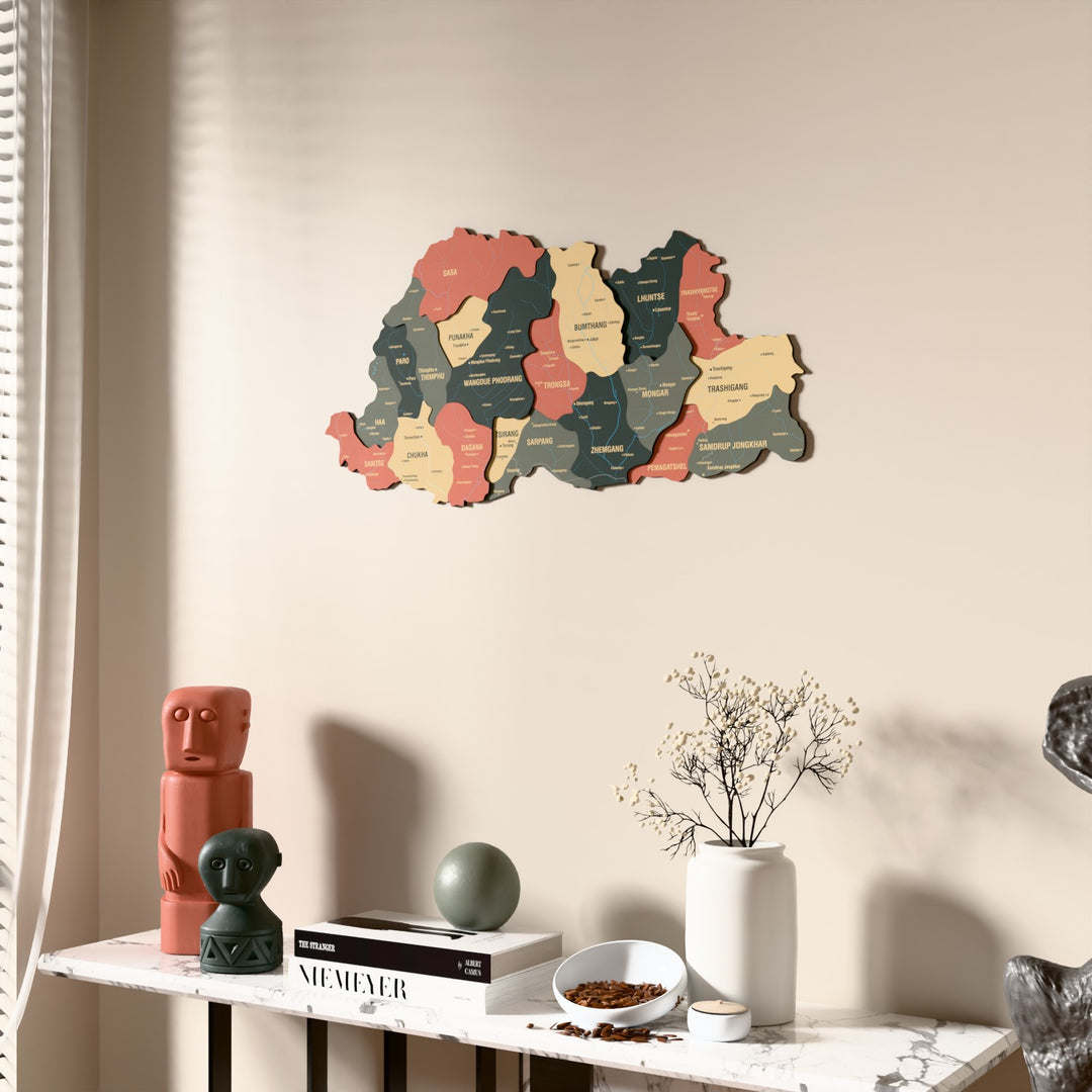 Sage Bhutan wooden wall map beside a sheer curtain, angled view