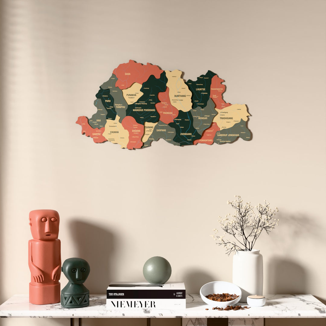 Sage Bhutan wooden wall map above a marble console, front view