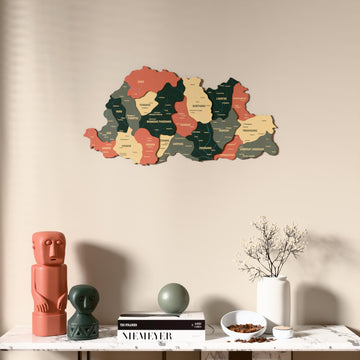 Sage Bhutan wooden wall map above a marble console, front view