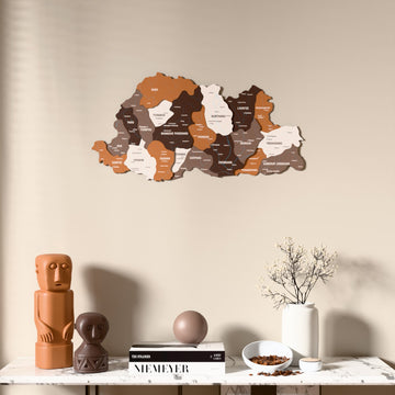 Soil Bhutan wooden wall map above a marble console, front view