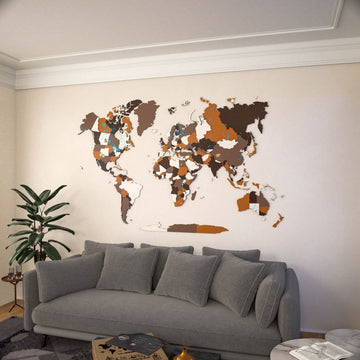 Blank Soil wooden world map without names above a gray sofa, wide view