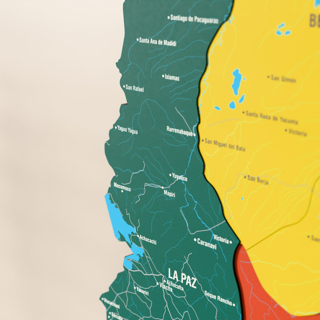 Close-up of the Flag colored Bolivia wooden wall map with layered regions and printed names