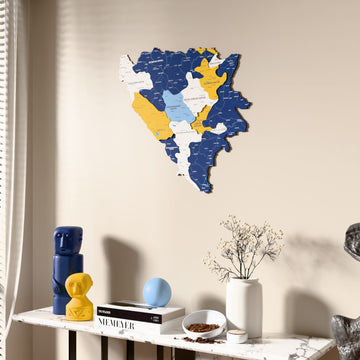 Flag colored Bosnia and Herzegovina wooden wall map beside a sheer curtain, angled view