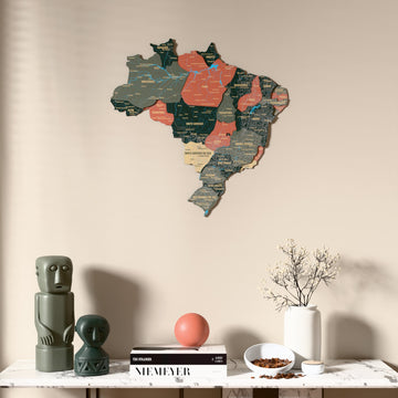 Sage Brazil wooden wall map above a marble console, front view