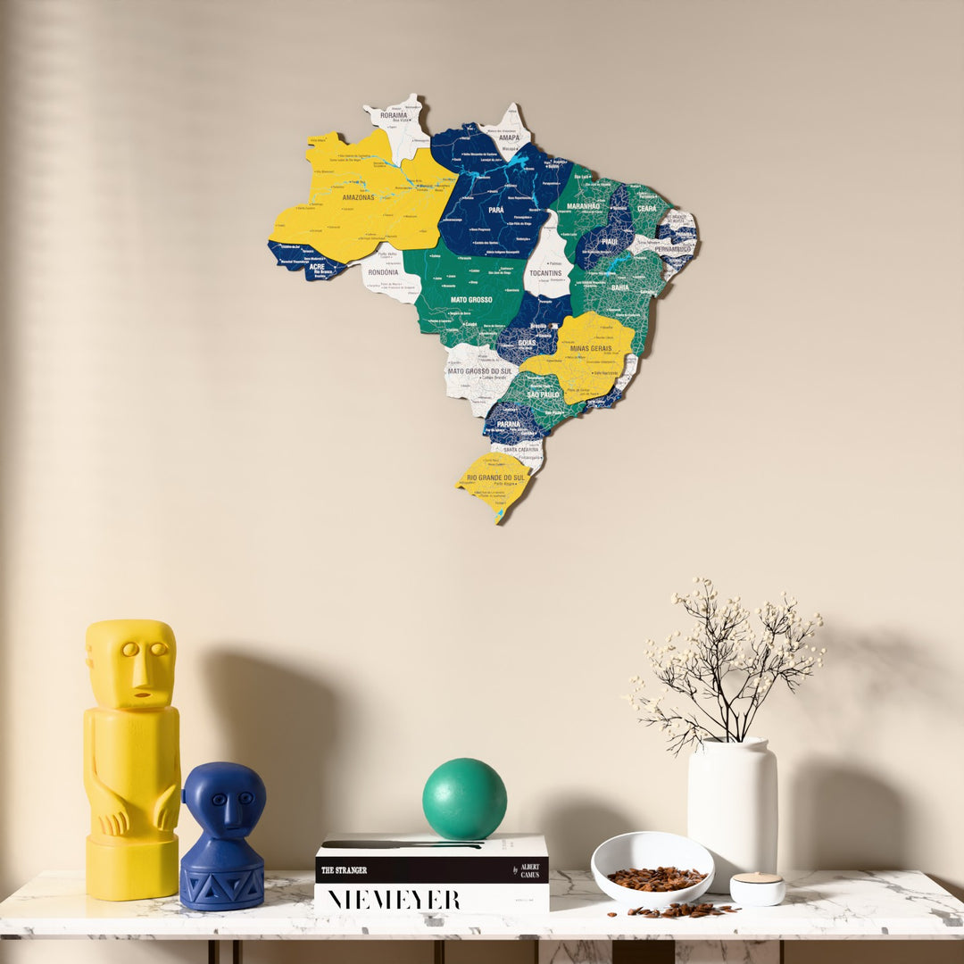 Flag colored Brazil wooden wall map above a marble console, front view