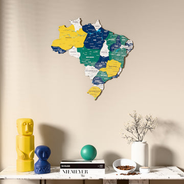 Flag colored Brazil wooden wall map above a marble console, front view