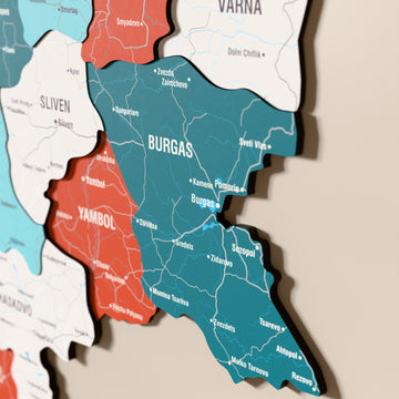 Close-up of the Flag colored Bulgaria wooden wall map with layered regions and printed names