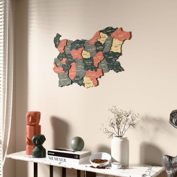 Sage Bulgaria wooden wall map beside a sheer curtain, angled view